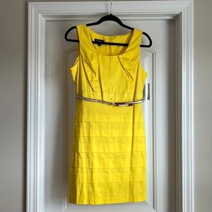 Yellow sleeveless, belted dress